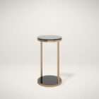 Round side table with black glass top and base, supported by a slim gold metal frame.