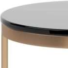 Round side table with black glass top and base, supported by a slim gold metal frame.