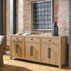 Light wood credenza with three drawers and six cabinet doors, featuring black metal hardware.