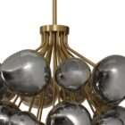 Modern chandelier with brass frame and clustered smoked glass globe shades creating a sculptural lighting fixture.