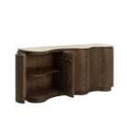 Curved wood sideboard with fluted doors and a light stone top in a warm modern design.