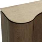 Curved wood sideboard with fluted doors and a light stone top in a warm modern design.
