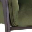 Modern lounge chair with a deep green velvet upholstered seat and backrest, supported by a slim dark wood frame with clean lines.