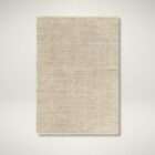 Neutral beige woven area rug with subtle tonal variation and organic texture.