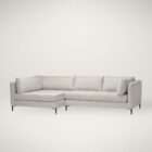 Grey upholstered sectional sofa with chaise, clean lines, plush cushions, and slim black metal legs.
