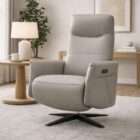 Light grey leather power recliner chair with padded arms, high back, and black swivel base.