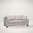 Grey upholstered sofa with track arms, plush seat cushions, and black wood block legs.