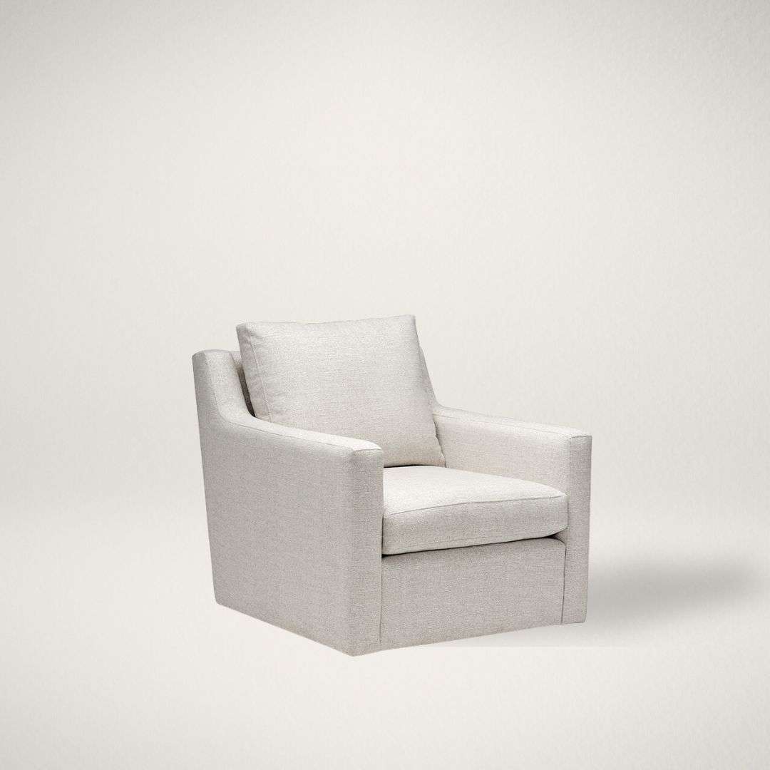 SY SCOPE Light neutral upholstered armchair with clean lines, track arms, and a plush seat cushion.