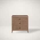 Wood nightstand with three drawers, vertical fluted detailing, and a warm natural finish with round metal knobs.