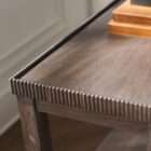 Long wooden console table with a lower shelf, curved legs, and detailed edge trim in a warm medium wood finish.