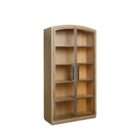 Tall wood display cabinet with arched top, glass-paneled double doors, and interior shelving with warm lighting.
