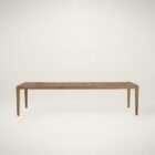 Long rectangular wood dining table with a slim profile, natural finish, and tapered legs.