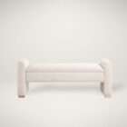 Upholstered bench in a soft textured cream fabric with curved arms on each end and a clean, tailored silhouette.