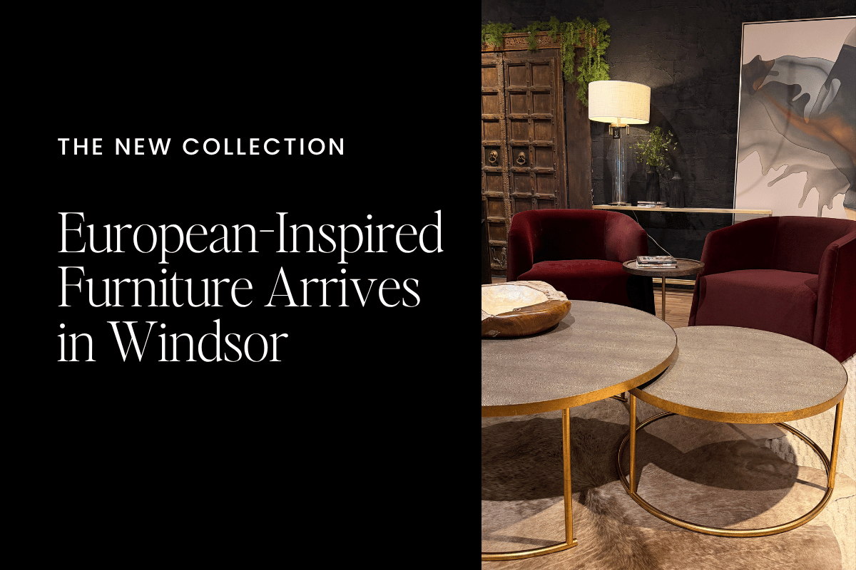 Urbanhome Interior Design showroom featuring European-inspired furniture, burgundy lounge chairs, layered coffee tables and warm contemporary decor in Windsor, Ontario.