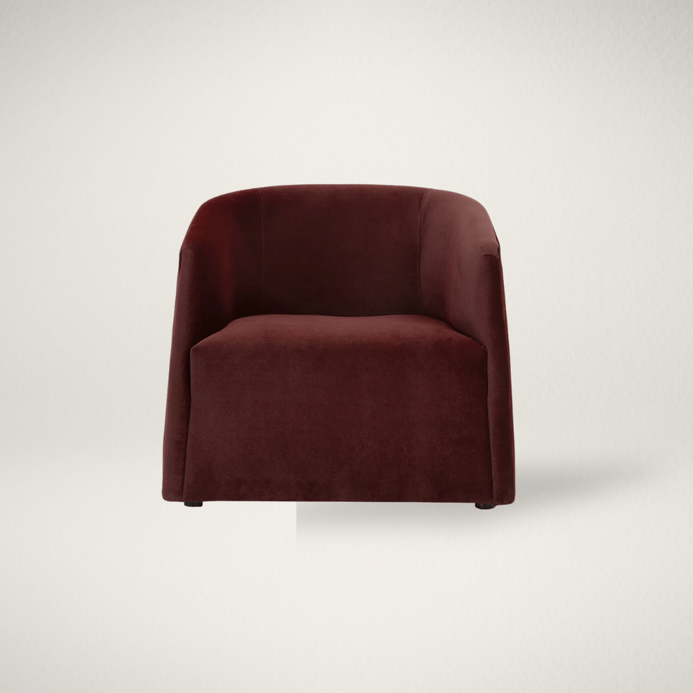 Cover - SP Serenade Lounge Chair Serenade Lounge Chair in Rocha Merlot fabric with a curved barrel back and deep burgundy upholstery.