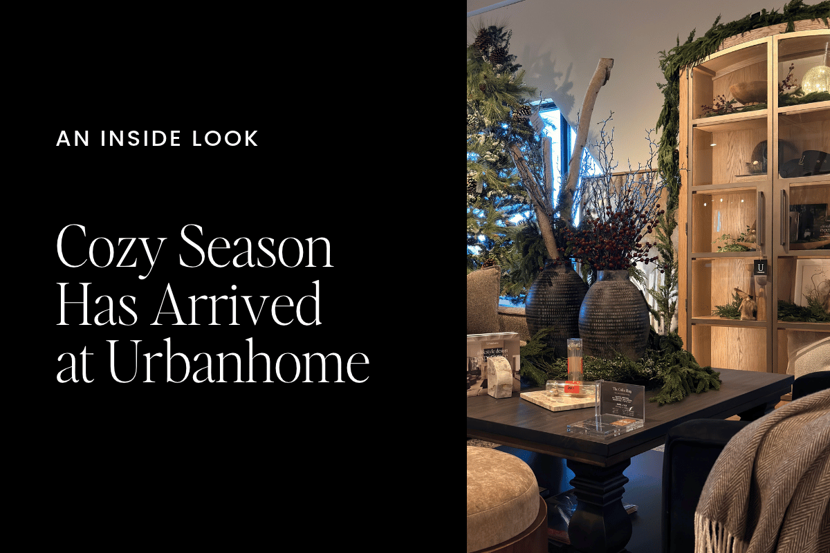 Urbanhome Interior Design's cozy season collection featuring a luxury living room display with Christmas greenery, decorative vases and a glass-front cabinet in Windsor, Ontario.